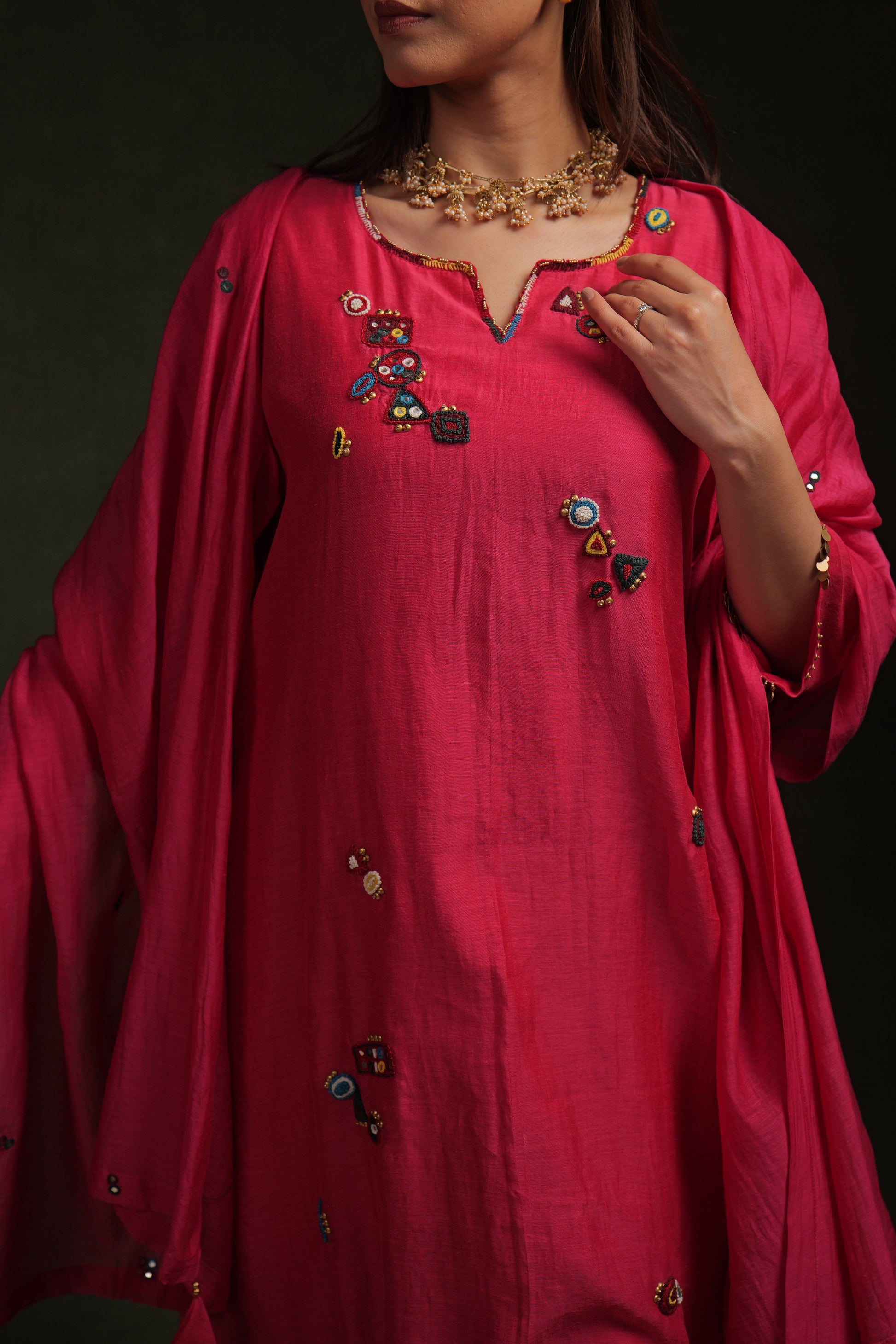 Magenta mul chanderi kurta set with multicolor hand embroidery by Asaaye
