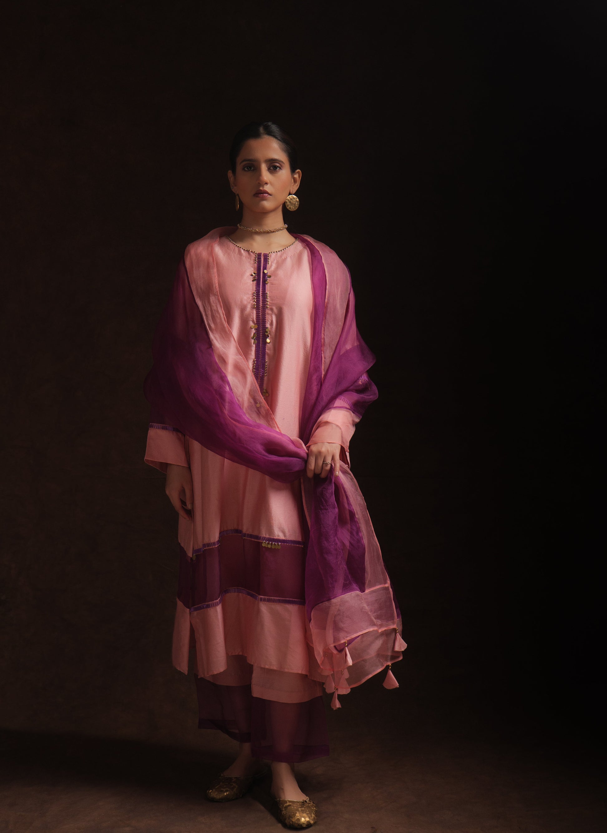 Salmon pink chanderi kurta set with purple organza panels and dupatta by Asaaye