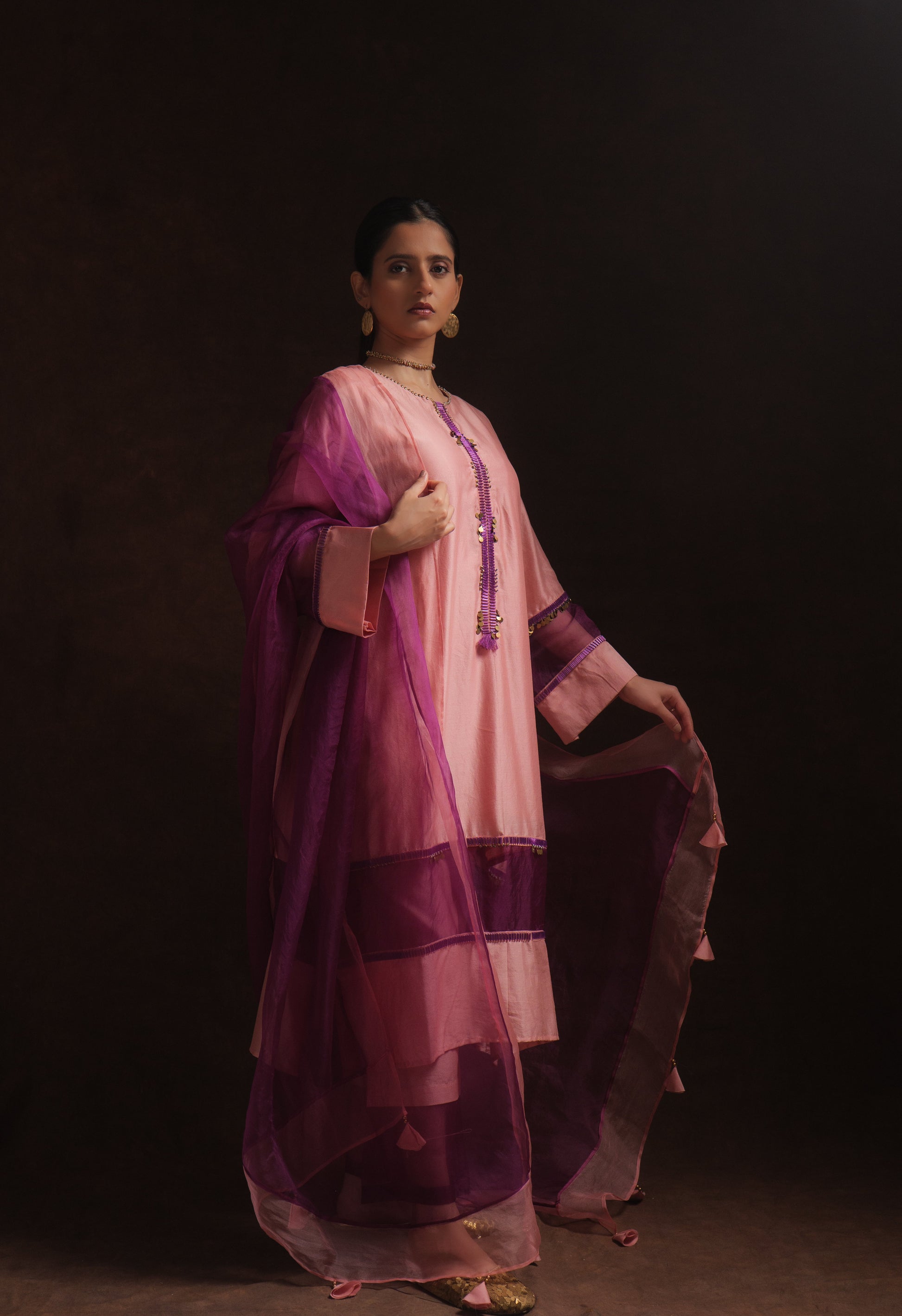 Salmon pink chanderi kurta set with purple organza panels and dupatta by Asaaye