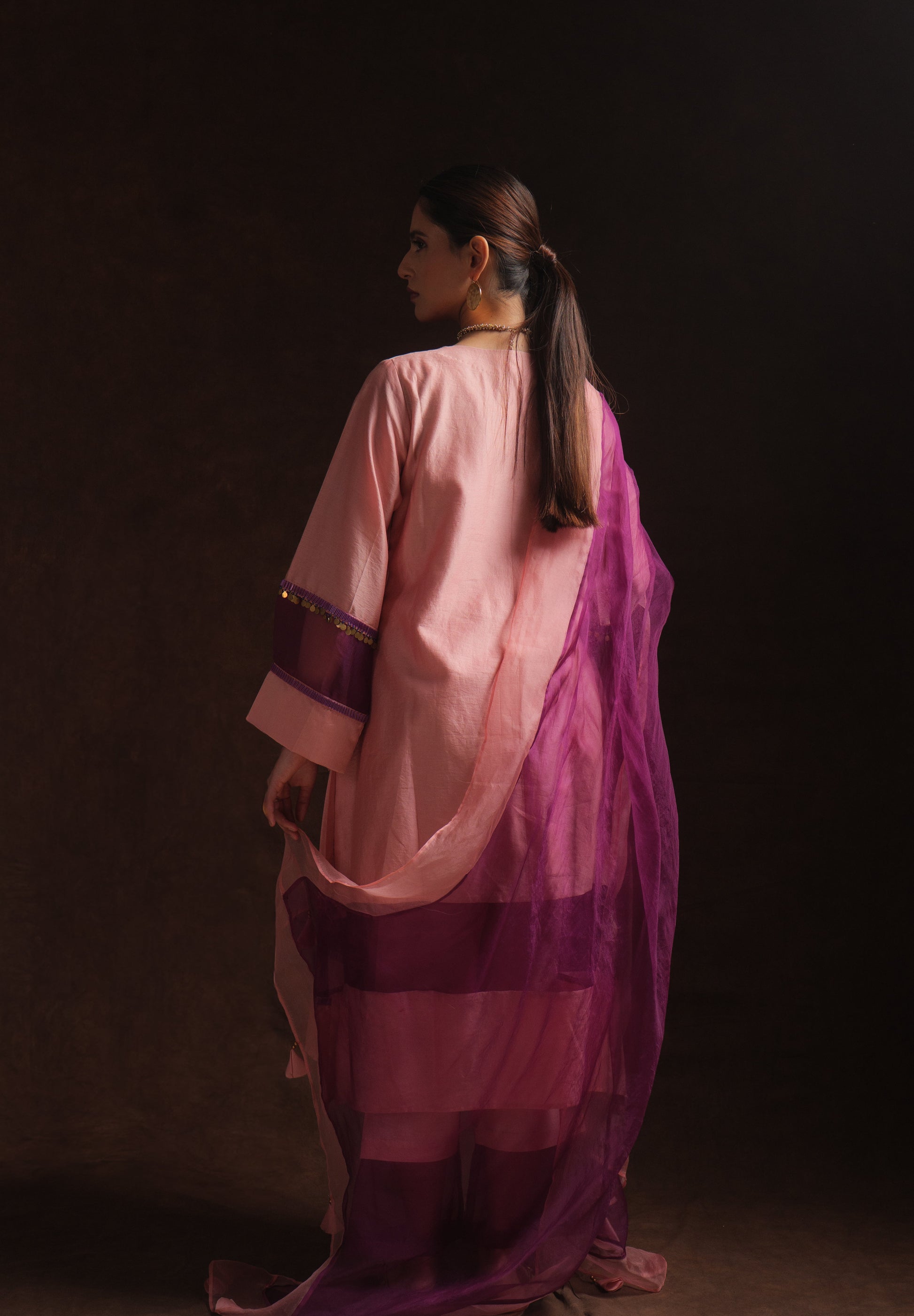 Salmon pink chanderi kurta set with purple organza panels and dupatta by Asaaye
