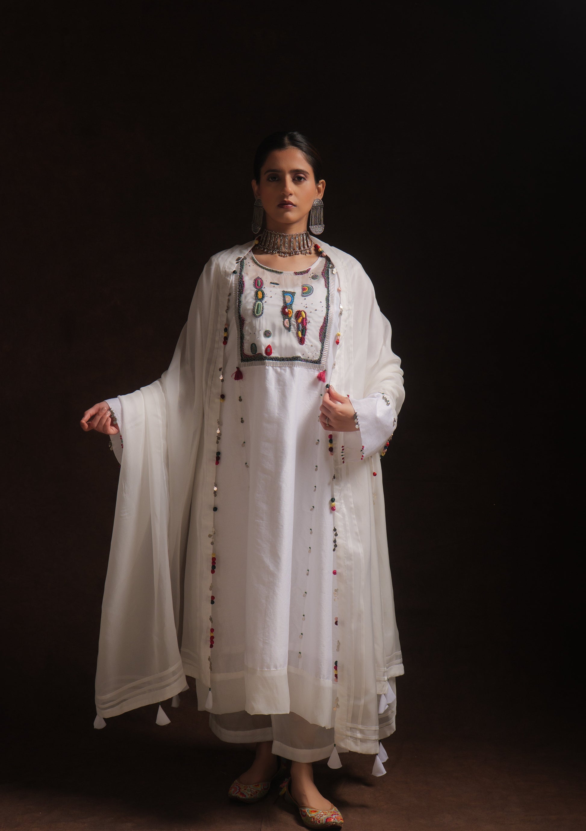 White chanderi kurta set with abstract embroidery, organza panels and dupatta by Asaaye