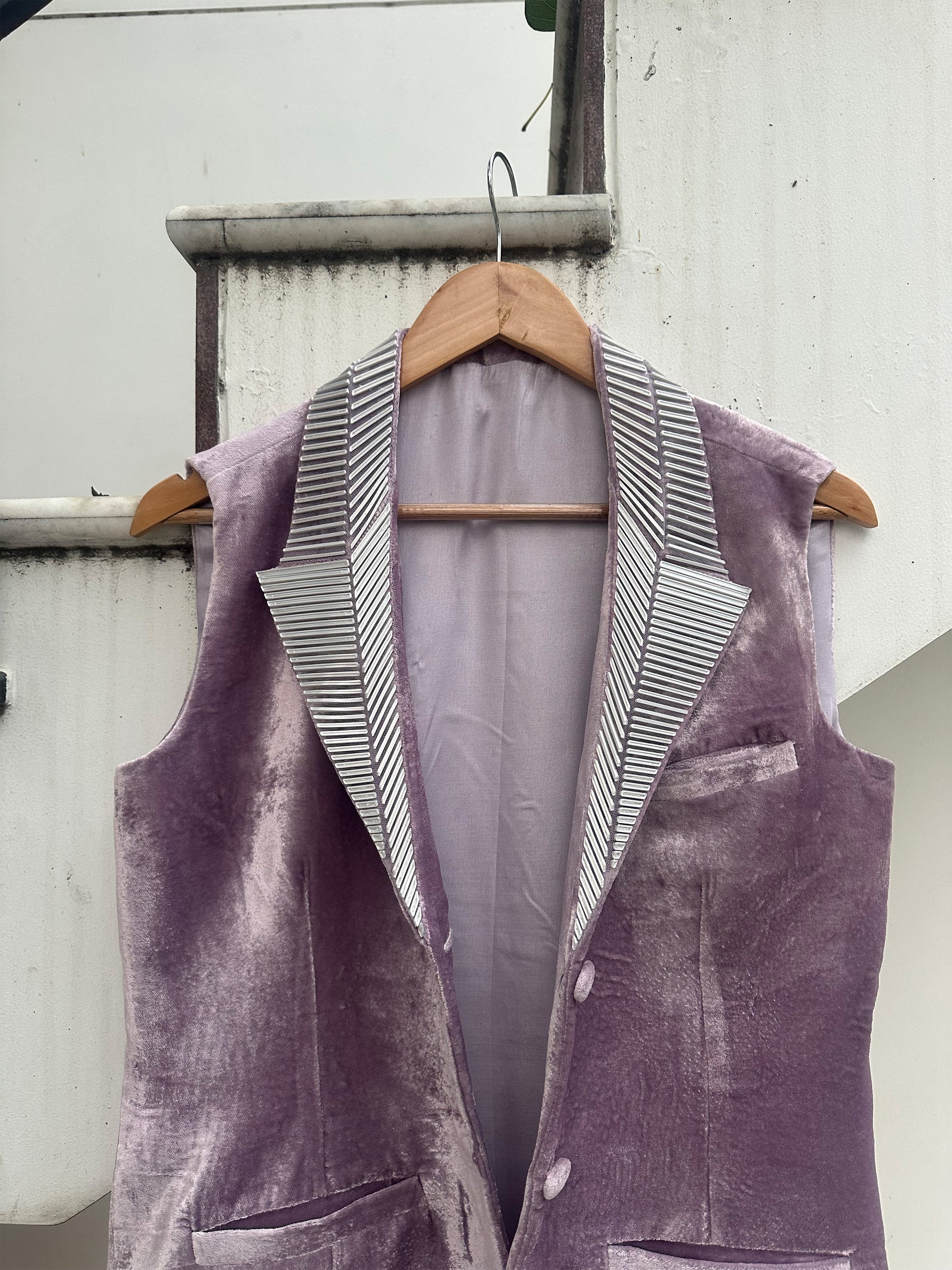 Lilac sleeveless velvet jacket with metallic 3D silver detailing on lapel and collar by Asaaye