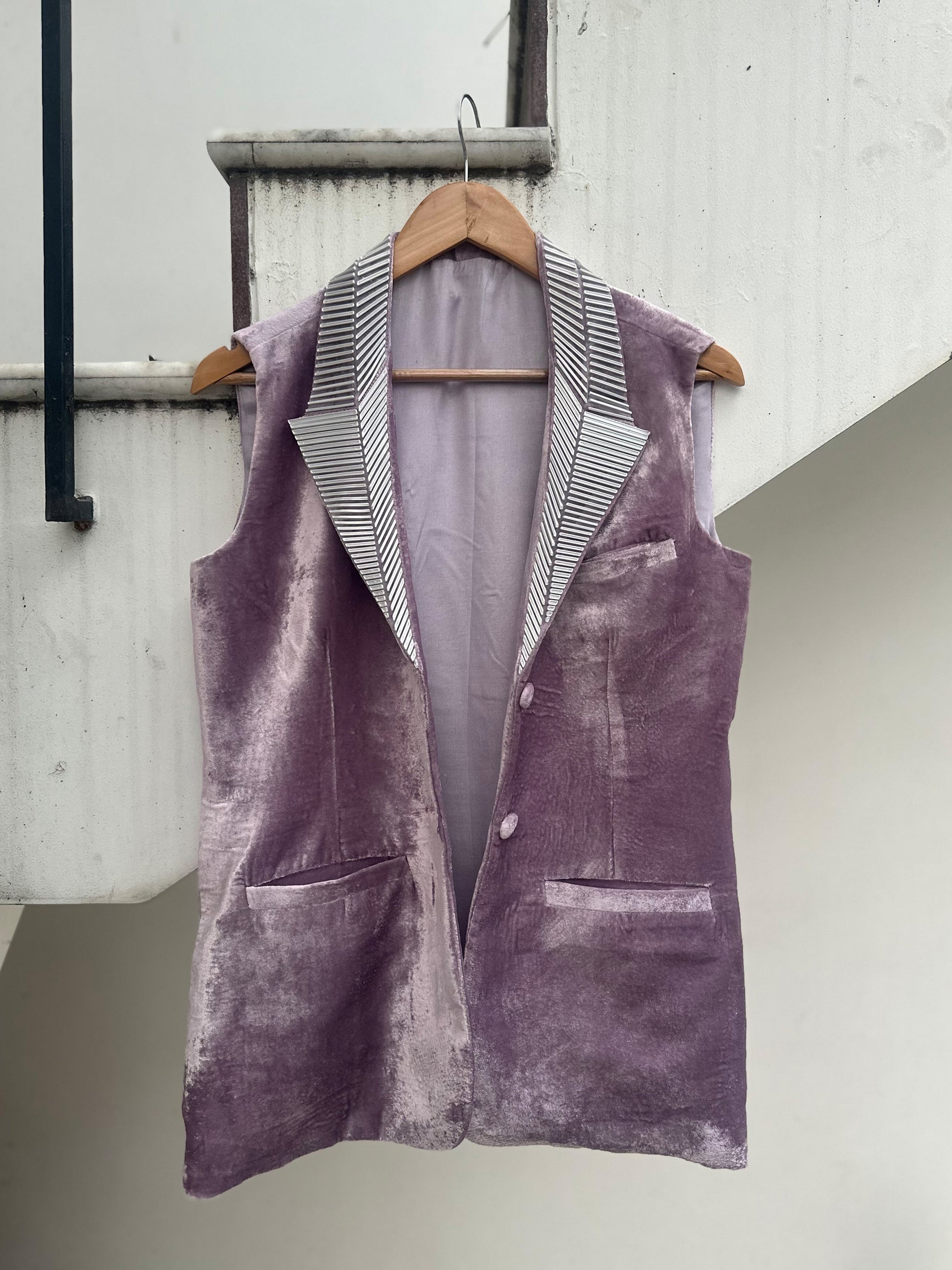 Lilac sleeveless velvet jacket with metallic 3D silver detailing on lapel and collar by Asaaye