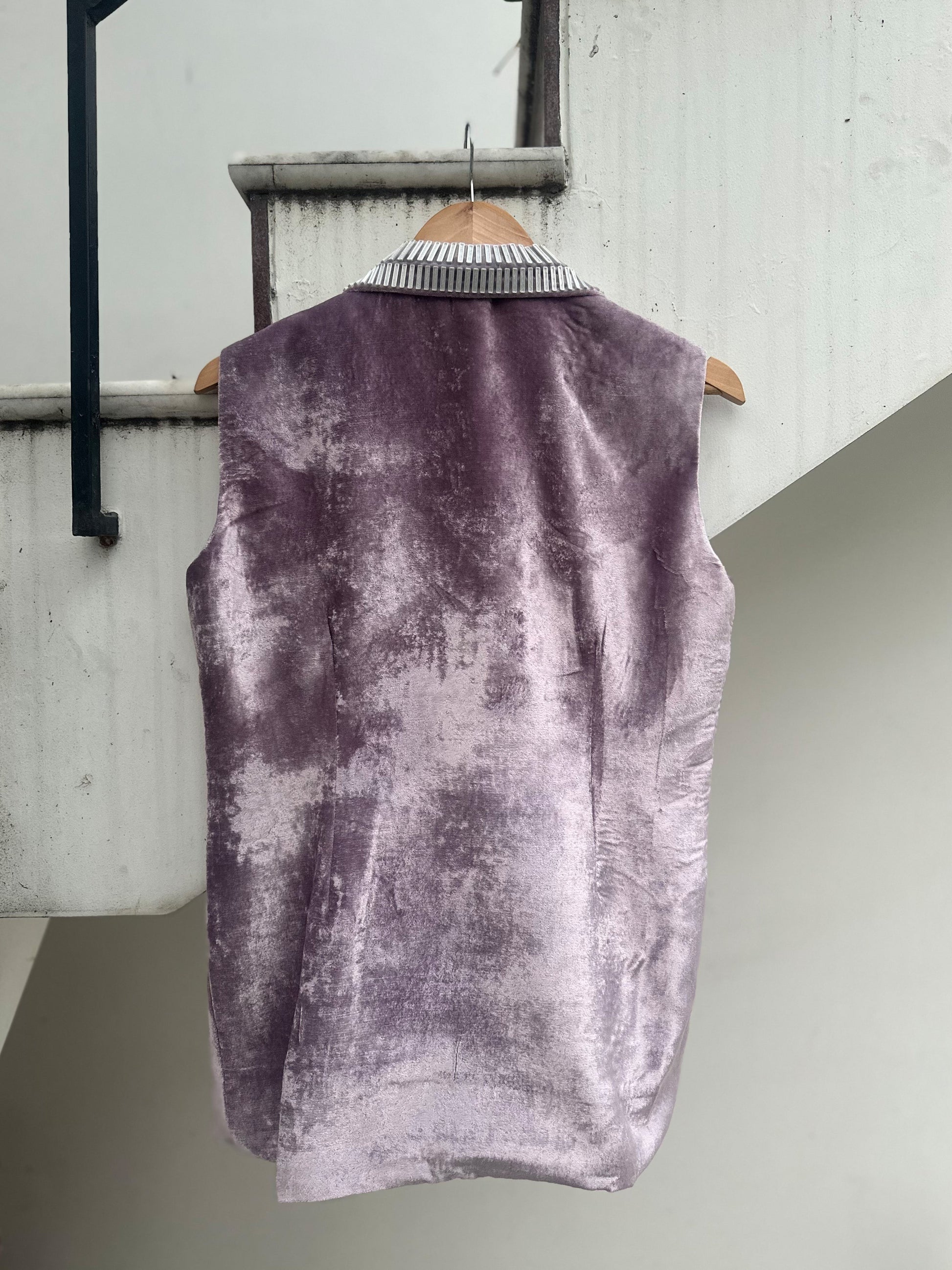 Lilac sleeveless velvet jacket with metallic 3D silver detailing on lapel and collar by Asaaye