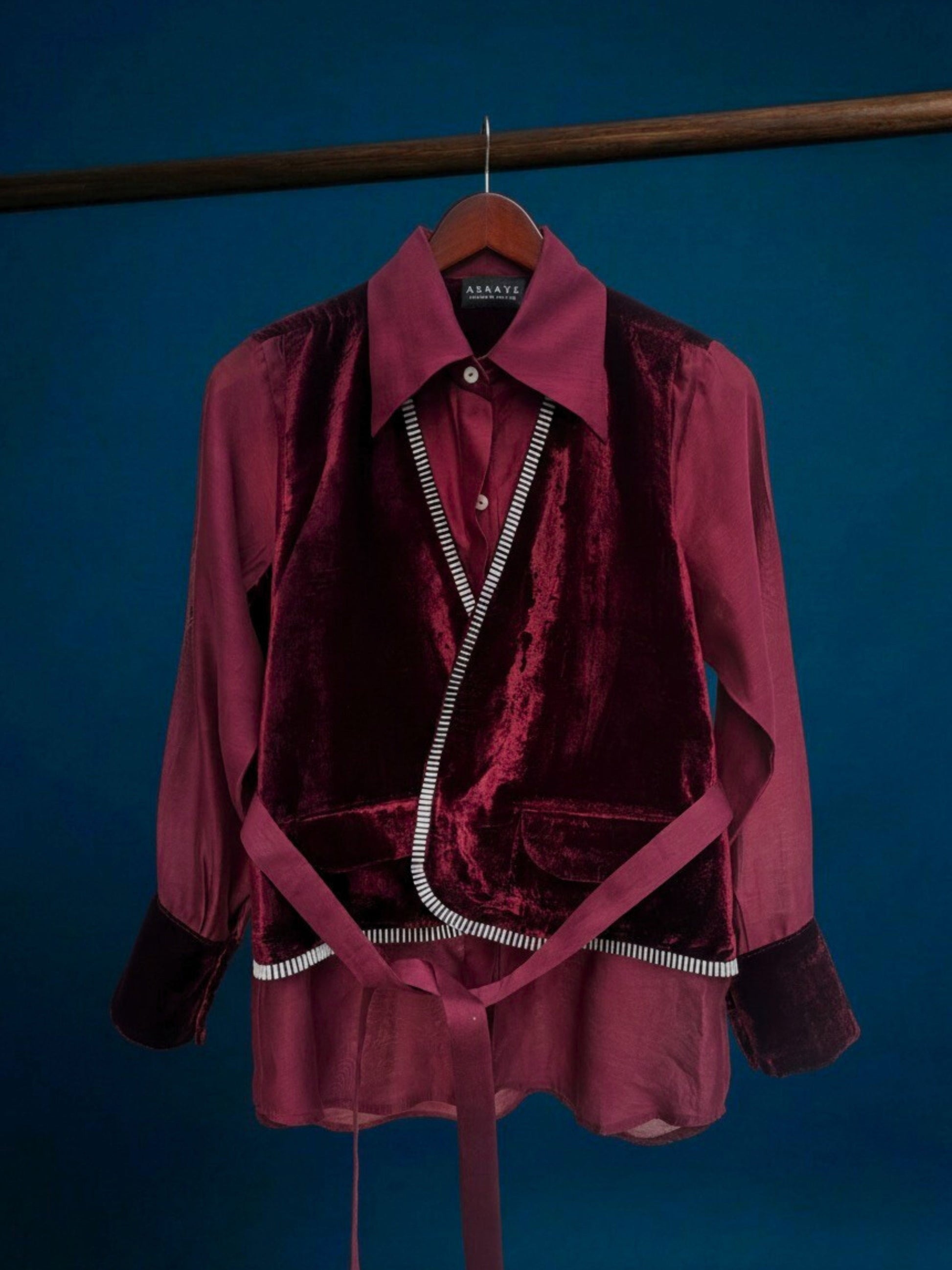 Cherry chanderi shirt for women with attached velvet waistcoat, metallic 3D texture detailing, velvet cuffs and back yoke by Asaaye